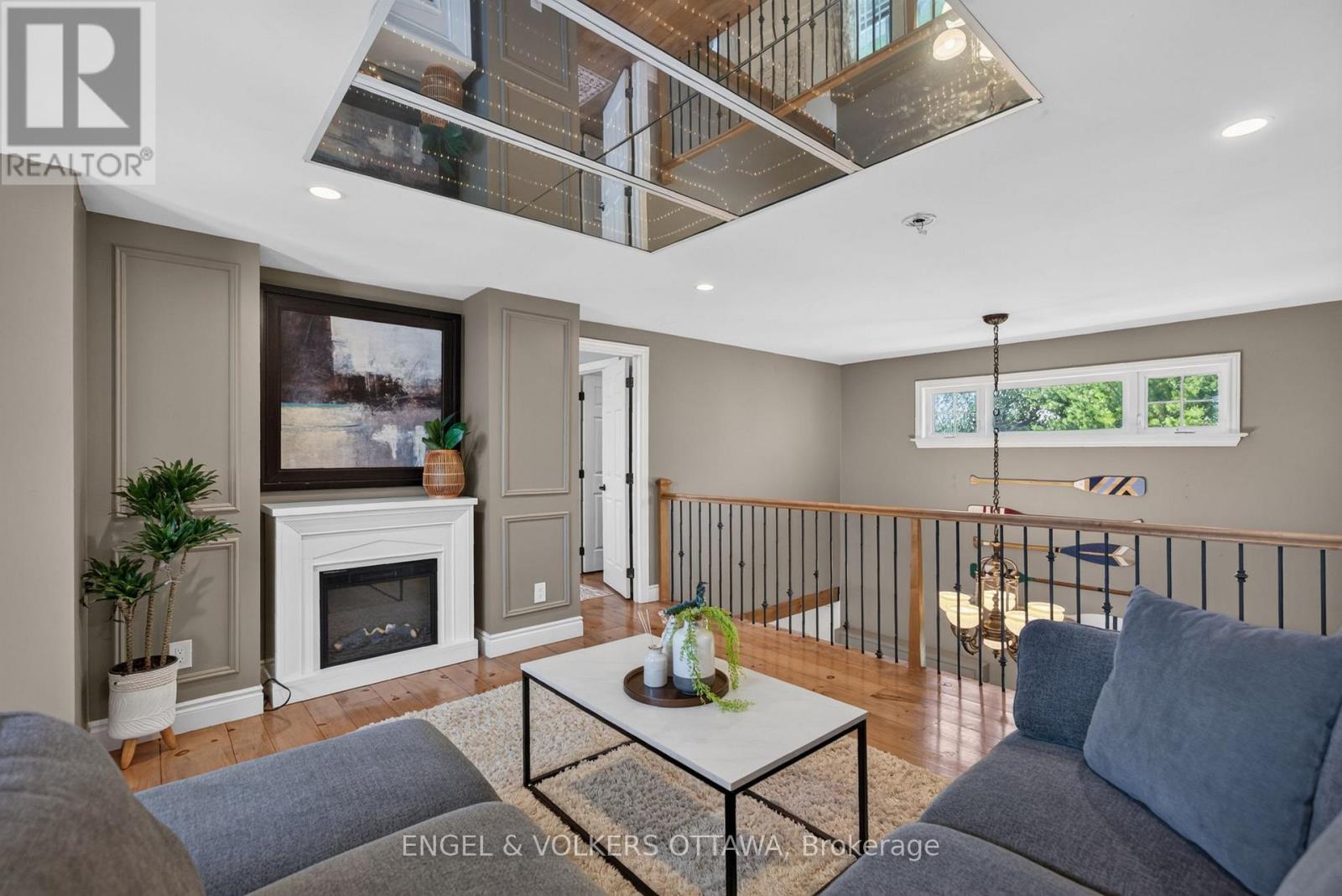 Third-floor living room with fireplace